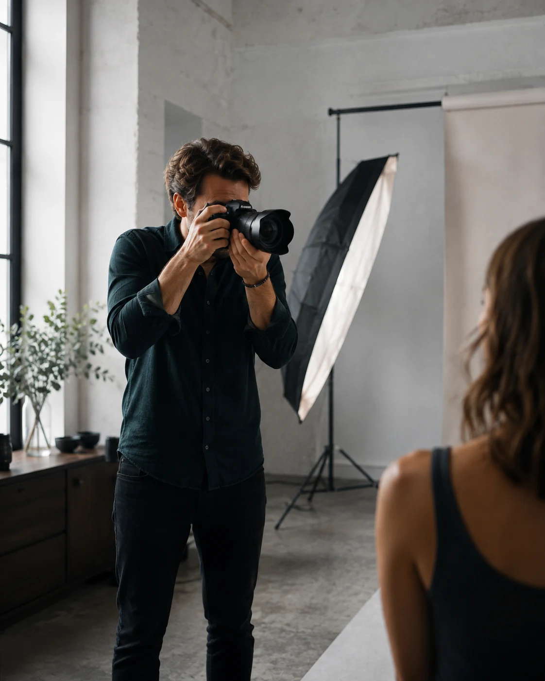 Photographer preparing a studio shoot